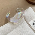 Close-up of iridescent acrylic bangle with chunky wave design and laser rainbow finish - Iridescent - Geometric