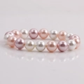 Detail view of multi-color shell pearl bracelet with pink, white and purple beads - Pink/White/Purple