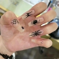 Long coffin Halloween press-on nails with nude base and black spider web fire designs - R846 Halloween Spider / Nail Glue Version