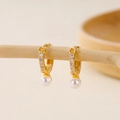 Detail view of gold-plated hoop earrings featuring white pearls and clear cubic zirconia - Simple Elegant Pearl Ear Buckle (EH412008)