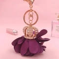 Deep purple fabric flower keychain with gold crown and sparkling crystal rhinestones - Crown Flower Purple