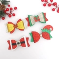 Set of four glitter Christmas hair bows with festive patterns on a clean white background - Custom Style