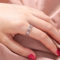 Detail of silver honeycomb ring with cubic zirconia stones on silk background - Silver Beehive Hexagon