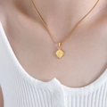 Gold plated snake chain necklace featuring a round zodiac relief pendant on a female model - P1586-Portrait Coin Pendant-Snake Chain