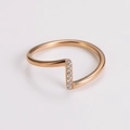 Detail of rose gold wavy ring with paved zircon accents and unique open design - US 6 / Rose Gold
