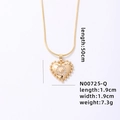Golden heart pendant necklace with crystal letter Q charm and sleek snake chain - Letter Q