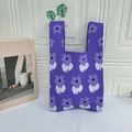 Close-up of purple knitted tote bag with white flower patterns and woven texture - Flower Purple / Purple
