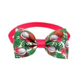 Macro shot of tropical bow tie with coconut, hibiscus, and palm leaf patterns - Coconut