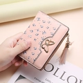 Pink floral bifold short wallet with gold butterfly clasp and tassel zipper detail - Pink