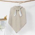 Detail of baby hooded cotton gauze towel with cute rabbit ears on a wooden branch - 75x75cm / Khaki