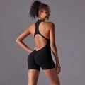 Detail of black one-piece yoga romper with hollow back and scrunch butt design - S / Top And Bottom / Black