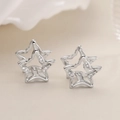 Orecchini a stella in argento placcato oro bianco 18K con zirconi per donne eleganti - Argento