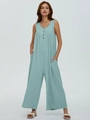 Detail of mint green ribbed knit sleeveless jumpsuit with buttons and side pockets - Green
