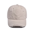 Detail shot of distressed cotton baseball cap with vintage frayed holes in beige color - Adjustable: 56-60cm / Beige