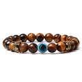 Detail of tiger eye stone beads with golden crowns and a blue evil eye charm - Yellow Tiger Eye (04)