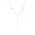 Minimalist Y-shaped golden stainless steel necklace with geometric circular charms on white - Gold Round Disc Style