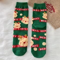 Green combed cotton Christmas socks with plush reindeer and red stripes holiday design - One Size / Green