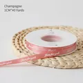 Pink champagne satin ribbon 1cm wide with Just for you print for floral gift wrapping - EU 40 / 1.0 Printed Ribbon-Champagne