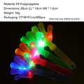 Set of four colorful LED hand clappers in red, yellow, green and blue for cheering - Glowing Style / 28cm