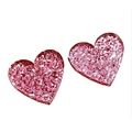 Close-up of pink glitter heart earrings for Valentine party jewelry accessories - Pink Glitter Heart