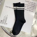 Black ribbed cotton crew socks featuring double white horizontal stripes on the cuffs - Striped Slouch Socks (No.01 Black White)