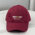 Close-up of vintage burgundy cotton baseball cap with distressed details and embroidery - Burgundy