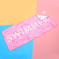 Pink zebra print quick-dry beach towel featuring white SWIMMER text and a hanging loop - Pink Zebra / 70*150cm