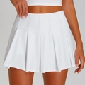 Women's high-waisted white pleated tennis skirt featuring moisture-wicking cooling fabric - S / Elegant White