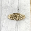 Elegant gold oval hair clip with hammered texture finish on white textured paper - 2# Gold (Hammered Oval)