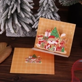 Detailed 3D pop-up Christmas card featuring Santa and reindeer on a rustic wooden desk - Santa's Gift
