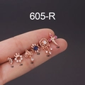 Dettaglio del set di sei orecchini in acciaio inossidabile oro rosa con zirconi cubici - 1# Stile Luna e Stella / Oro rosa