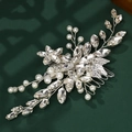 Silver bridal hair comb with white pearls and clear rhinestones on green background - Silver Clear Crystal Artificial Pearl Hair Comb (HS-J5667A)