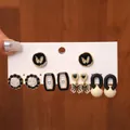 Set da 5 paia di orecchini vintage in acrilico con fiori e cuori neri e dettagli oro - Perno in Argento-Nero (Set da 10 pezzi)