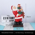 30cm Resin Santa Claus figurine holding gifts for festive Christmas home decoration - Santa with Bear and Gift Box