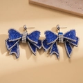 Exquisite blaue Schleifen-Ohrstecker mit schimmernden Kristallen und Silbernadeln - Blau