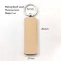 Detailed technical diagram of beech wood keychain showing 115mm length and 6mm thickness - Rectangle