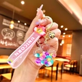 Pink unicorn oil-filled flower keychain with colorful moving beads and silicone strap - Glow-in-the-dark Rainbow Candy Beans [sunflower]