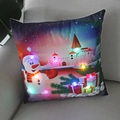 Detailed view of LED Christmas snowman pillow glowing with festive lights on sofa - Snowman & Castle Gifts-21M-7