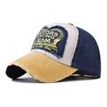 Detail of distressed brim and vintage moto racing patch on washed denim baseball cap - Navy Beige Ginger Patchwork(10)