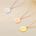 Tre ciondoli tondi in acciaio inossidabile argento, oro rosa e oro con Good Luck - Stile Good Luck (GOOD LUCK) / Oro