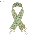 Close-up of green diamond jacquard strap with adjustable golden metal slide and lobster clips - Light Green