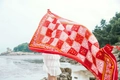 Ethnic style red beach shawl with geometric patterns flowing in the wind by the sea - Red Geometric Folk Print Style / Coral / 180cm