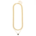 Detailansicht der zweilagigen Goldkette mit Blattkette und quadratischem schwarzen Edelstein - Halskette mit schwarzem Zirkonia