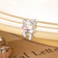 Silver kitten stud earring with pink heart gemstone and bow detail for girls - Pink (Single Piece)