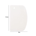 White D-shaped plastic cake scraper and dough cutter tool measuring 13.5cm by 9cm - D-shape Scraper / White