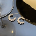 Macro shot of silver C-shaped earrings with micro-pave crystals and S925 hallmark - Bright Silver C-Shaped Stud Earrings (A-01)