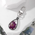 Portachiavi in resina a goccia con veri fiori secchi viola e chiusura in lega d'argento - Petalo Viola/Goccia d'Acqua