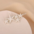 Fermaglio per capelli con stelle argentate testurizzate su base di seta beige - Argento