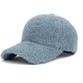 Close-up detail of soft blue sherpa fleece texture on a warm winter baseball cap - Light Blue