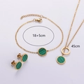 Detailed view of 18K gold-plated stainless steel jewelry set with green striped circular charms - Emerald Green Shell Three Piece Set